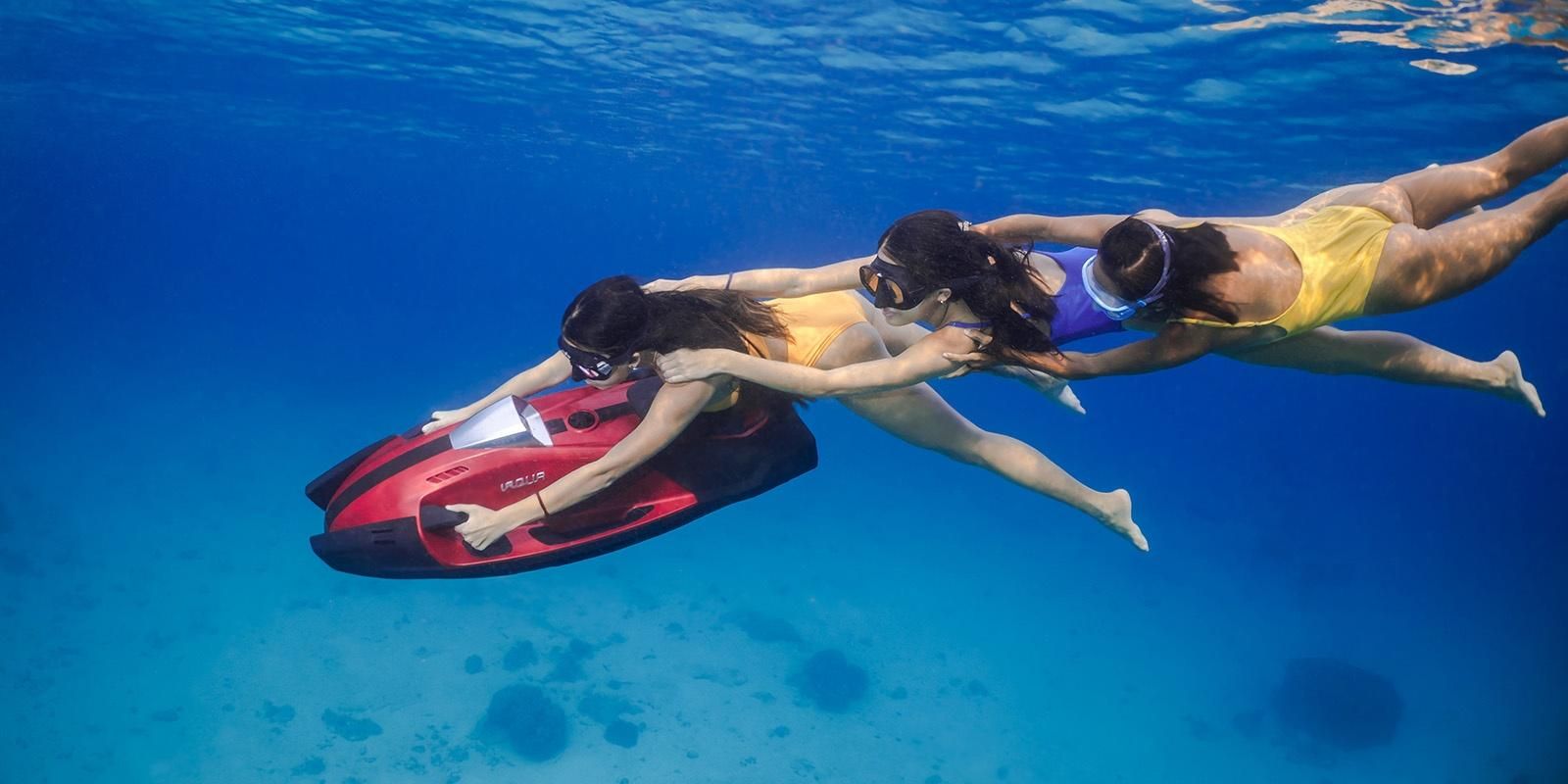 Freediving girls using iAQUA AquaDart Nano the lightest most powerful scooter in the world
